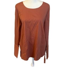 Dalia 3/4 sleeve blouse. Crew-neck, button-up back. Sz L. Brick, clay orange.